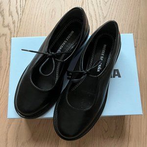 Nicole Saldana Fabiana black leather slippers